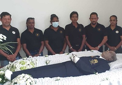 Announce the passing of beloved Ernest Fernando OLY